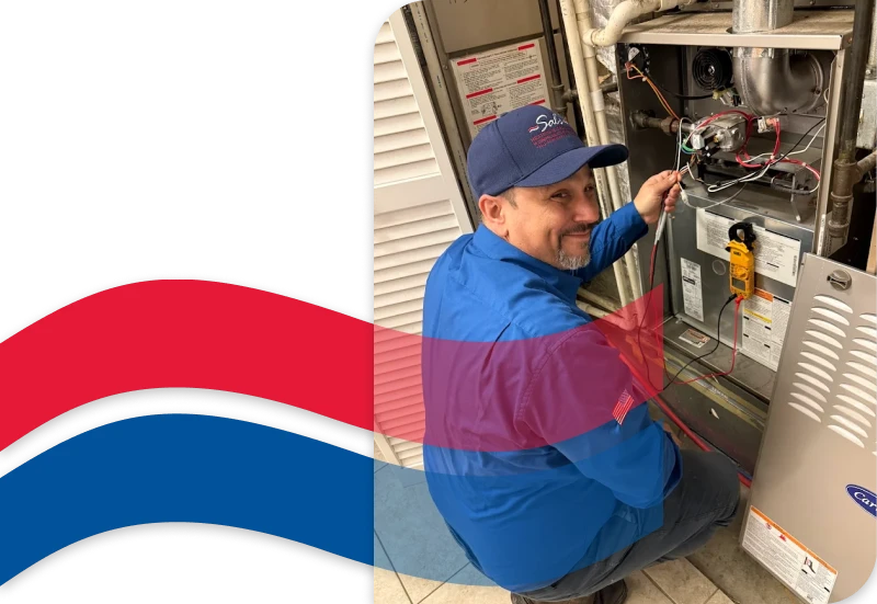 A technician in a blue uniform kneels while servicing an open furnace, holding wires and tools, with a multimeter attached to the unit. Red and blue swooshes overlay part of the image.